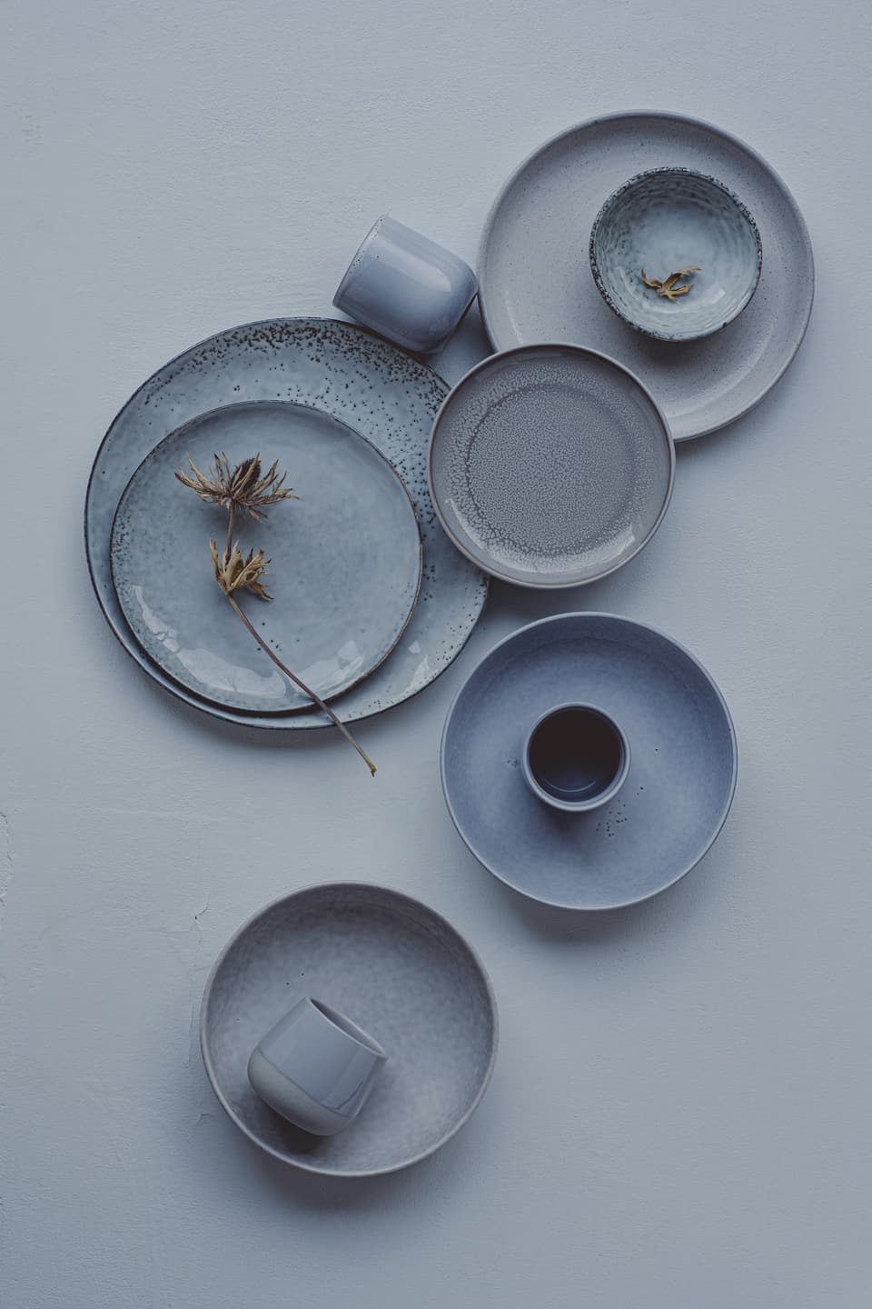 A table set with plates and cups